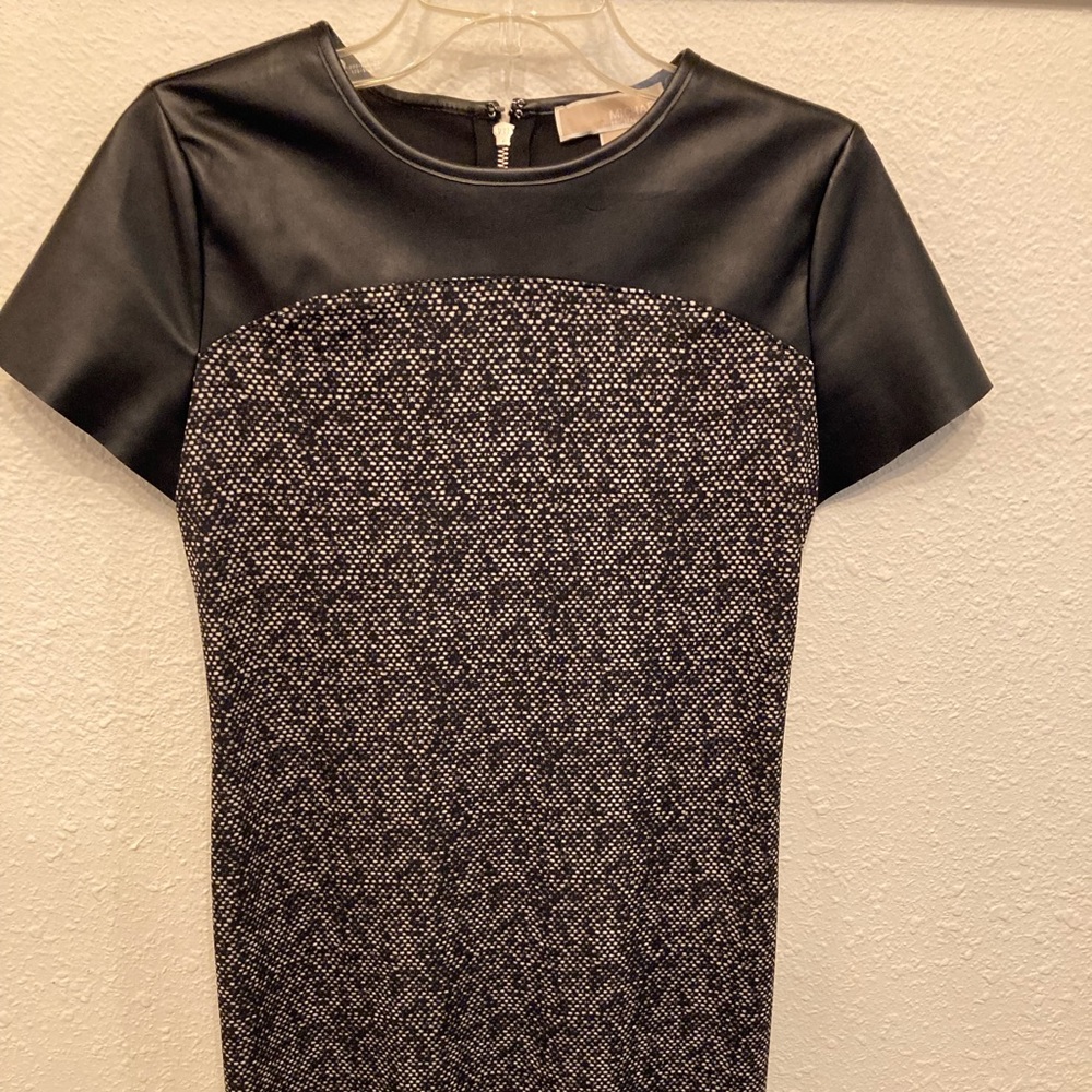 Michael Kors, size 2.  Great for a casual day at work.